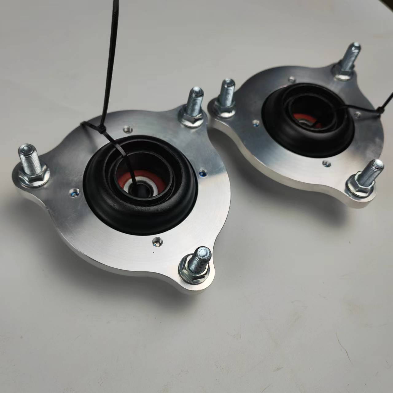Tilt adjustment plate suitable for various coilover shock absorbers