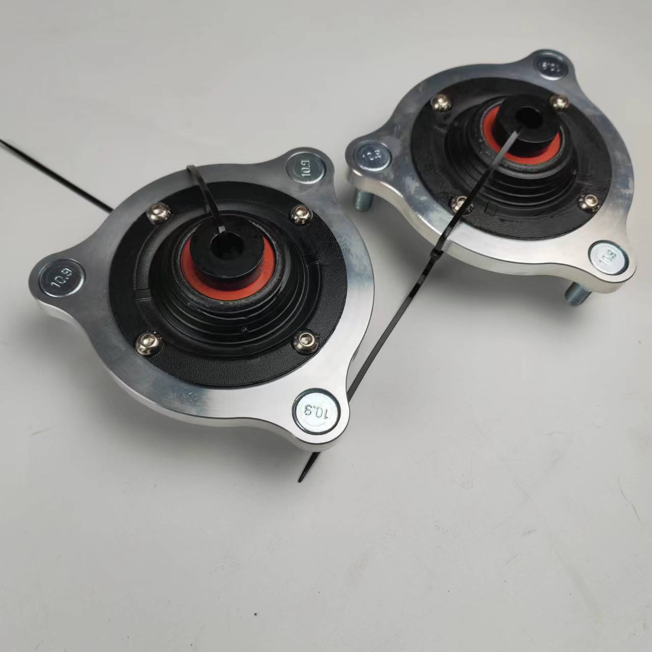 Tilt adjustment plate suitable for various coilover shock absorbers